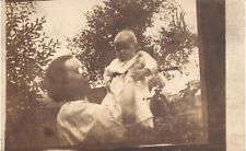 RPPC Real Photo Postcard Mother Holding Baby Out In Backyard Garden Glasses picture