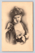 Portrait of Beautiful Woman Smelling Rose Flowers Bouquet Postcard picture