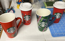 Two Ceramic Starbucks Coffee Mugs And Two Plastic Ones With Lids picture