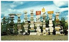 Watson Lake Canada Alaska Highway Sign Posts Unposted Postcard c.1960 picture