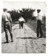 Vintage Old 1920 Funny Photo of Men Walking Away In between 2 other Men Offended picture