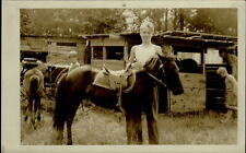 RPPC Teenage boy Edwardian era foal saddle stables 1926-40s real photo postcard picture