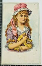 VINTAGE VICTORIAN TRADE CARD VICTORIAN GIRL HOLDING YELLOW RIBBON picture