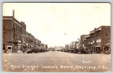 Redfield SD~Main Street Clock~New Central Hotel~Cafe~Lyric Theatre~1930s RPPC picture