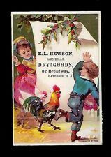 c1890's Trade Card E.L. Hewson Dry Goods, Boy & Girl Hanging a Sign, Rooster picture