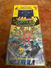 TMNT EASTMAN AND LAIRDS INTERGALACTIC WRESTLING CASSETTE AND COMIC  picture