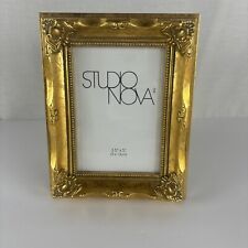 Gold Colored  Frame Holds 3.5x5