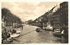 Boats Docked And Sailing At Christianshavns Kanal, Copenhagen, Denmark Postcard picture