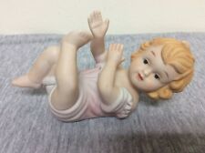 Vintage Porcelain Hand Painted Piano Baby Figurine picture
