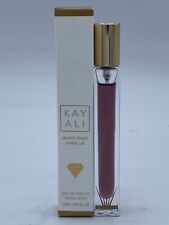 Huda Kayali Invite Only Amber 23 EDP Travel Spray 0.34 oz 10 Ml New In Open Box. picture