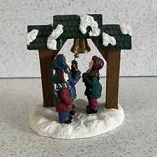 Mervyn's Village Square Children Ringing A Bell 1996 Figurine Holiday Christmas picture