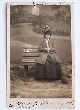 Vintage Humorous Woman On Bench Real Photo Postcard RPPC Sunbury to Howard Ohio picture