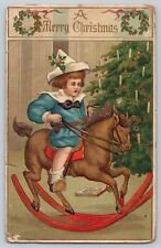 Postcard Merry Christmas Boy On Rocking Horse Christmas Tree With Candles 1910 picture