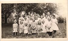 Vintage Postcard RPPC- A large family standing in a yard 1900s picture