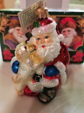 OLD WORLD CHRISTMAS SANTA'S PUPPY LOVE GLASS CHRISTMAS ORNAMENT 40293 picture