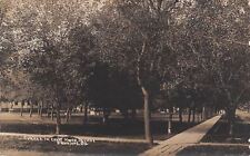 Brookings South Dakota~Corner in Court House Square Under Trees~1911 RPPC picture