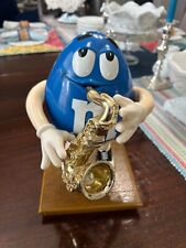 Blue M&M peanut Saxophone Player 
