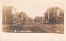 RPPC Main St Barthgate (Bathgate) North Dakota Dirt Street Kruxo 1909 Postcard picture
