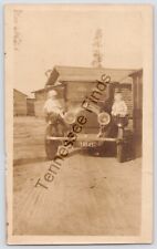 1920s Black And White Photo Of Two Baby's Sitting On The fenders 1920s Car picture