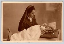 Postcard RPPC Newborn Baby with Nun Real Photo picture