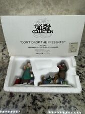 Dept 56 Don't Drop The Presents Christmas In The City Set of 2 , Children Dog  picture