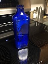 Vintage Cobalt Blue & Brown Glass Bottles picture