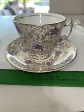 PHOENIX Bone China Gold Chintz Teacup and Saucer with lavender Flowers picture