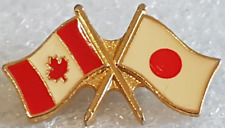 VINTAGE CANADA AND JAPAN FLAG FRIENDSHIP SOUVENIR LAPEL PIN METAL COLLECTIBLE picture