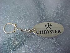 1970s CHRYSLER SOLID OVAL BRASS NOS KEY CHAIN USA MADE QUALITY MoPaR ACCESSORY picture