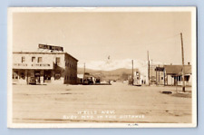 RPPC 1935. WELLS, NEVADA. HOTEL, TOOMBS GARAGE, STREET VIEW. POSTCARD 1A36 picture