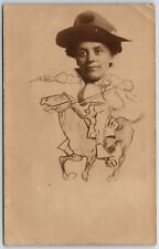 exaggerated head rppc woman in hat riding horse 1909 picture