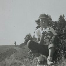 Little Girl In Baseball Cap Eating Sandwich In Grass B&W Photograph 3 x 3 picture