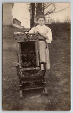 RPPC Darling Young Lady Striped Dress With Chair In Yard Postcard Q27 picture