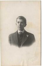 Postcard RPPC Young Man in Studio with Flower on Lapel c1910 Real Photo   picture