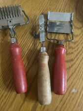 Vintage red handled utensils picture