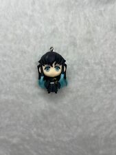 Cute tiny muichiro anime figure with black hair and blue tips on the ends  picture