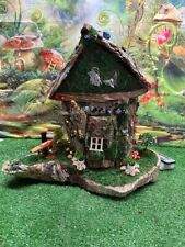 Fairy House Tree Stump Fully Decorated With Lights Must See picture