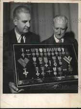 1960 Press Photo Group looks over medals displayed at Albany Academy, New York picture