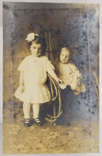 Real Photo Two Adorable Children in Studio Postcard picture