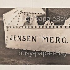 1910s RPPC Jensen Mercantile Company Parade Floater Wagon Sleepy Eye Postcard 2 picture