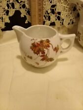 Antique porcelain German Austrian creamer brown leaves spherical round pitcher picture