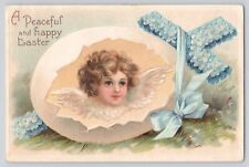 Postcard Easter Angel Head Inside Egg Bow & Blue Flowers Unsigned Clapsaddle picture
