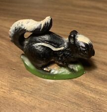 Vintage John Wright Painted Cast Iron Skunk On Grass Bottle Opener Decoration picture