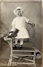 RPPC Little Girl with Teddy Bear Wicker Chair Antique Real Photo Postcard c1910 picture