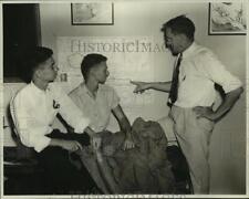 1948 Press Photo Theo Dorsa, boy scout leader points out route to Boy Scout Camp picture