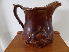 Large antique brown pitcher with swans 22