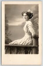 RPPC Gorgeous Lady~Half-Profile~Sitting on Rustic Rail Prop~Nice Backdrop~1907 picture