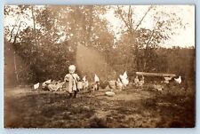 Little Girl Postcard RPPC Photo Feeding Chickens Hen On Field c1910's Antique picture