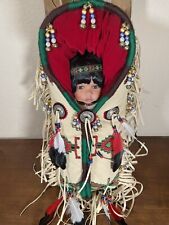 Native American Plains Indian Porcelain Doll on Beaded & Feathered Cradle Board picture