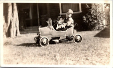 Cute Little Boy in Pedal Car w/Doll, c1930s Snapshot, #2314 picture